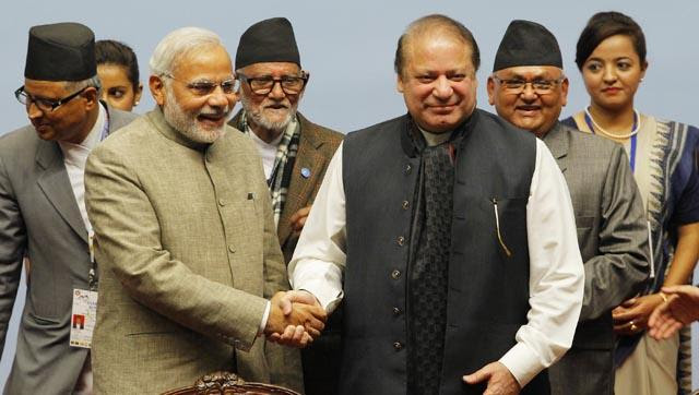 Prime Minister Narendra Modi shakes hands with his Pakistani counterpart Nawaz Sharif at the 18th SAARC Summit in Kathmandu, Nepal. (AFP)