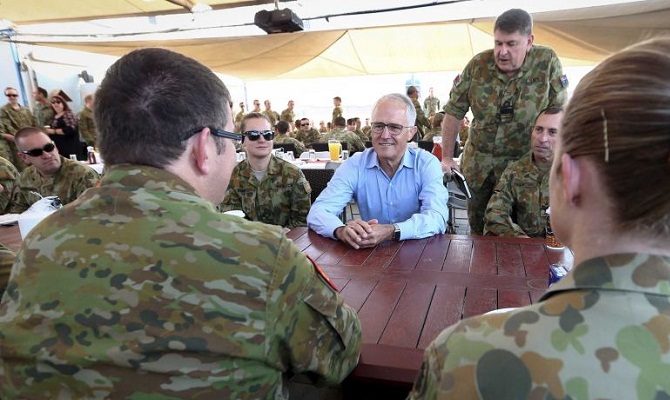 Australian Prime Minister Malcolm Turnbull has praised the international efforts by Australia Defence Force personnel during his visit to the Middle East, including talks with troops in Camp Bird in Iraq. (Reuters: Alex Ellinghausen)