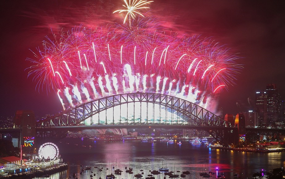 New Year's fireworks are seen above the Opera House and Harbour Bridge in Sydney, Australia. Over a million people gathered around the harbor to watch the 12-minute celebration for the start of 2018.